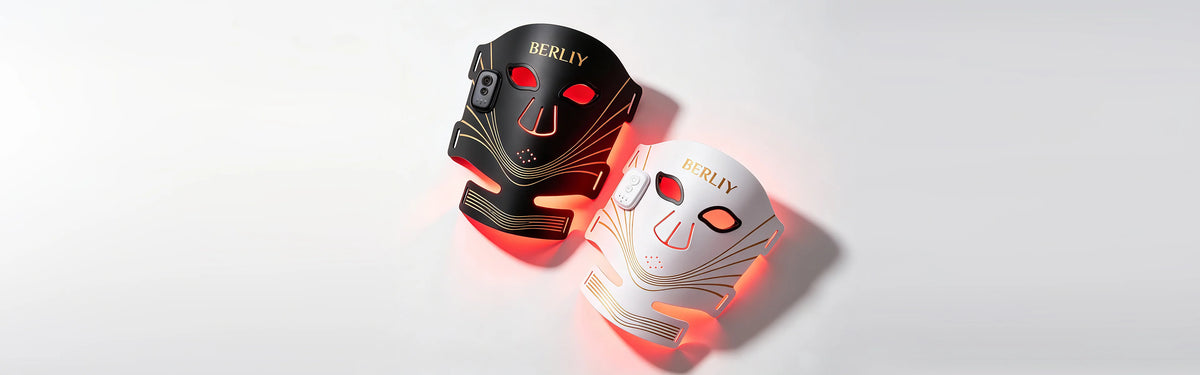 Black and white BERLIY LED face and neck masks with red light visible behind the panels.